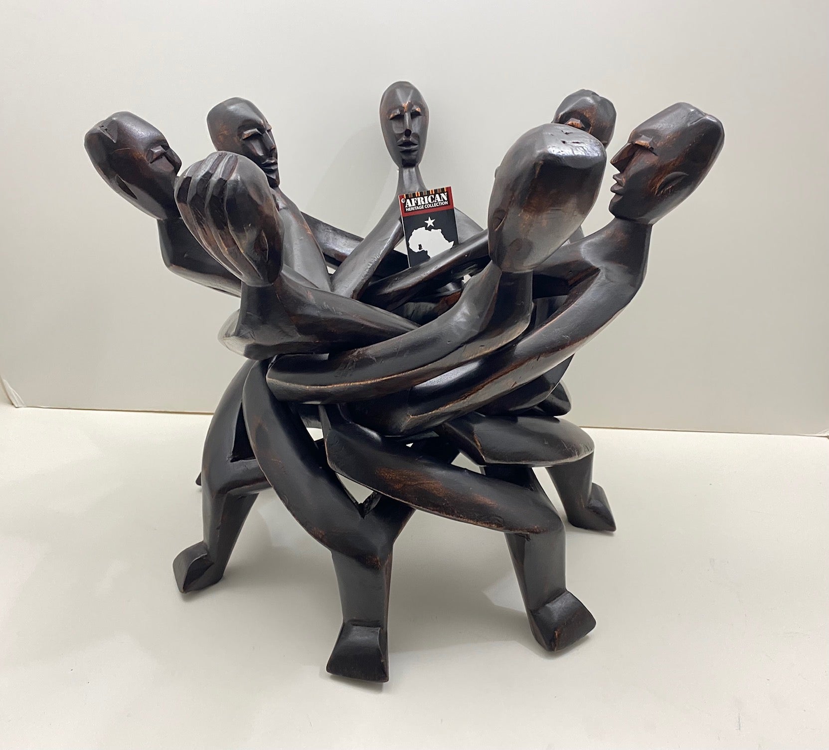 Handcrafted 7-Head Unity Stand | African Heritage Collection